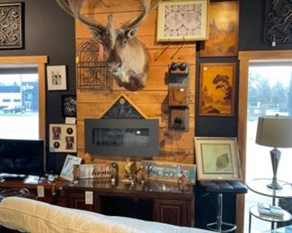 Beautiful Caribou Mount, Remote Control Wall Mount Electric Fireplce, Wood Carved Statues and  Borsato Milano Fisherman Statue