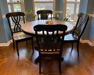 Dual tone round kitchen table with matching 4 chairs. 