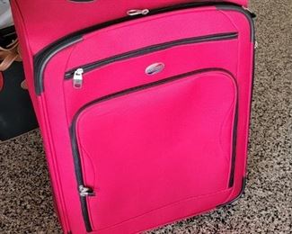 Red large suitcase