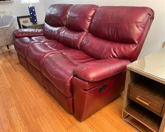 25_____NOW $200 was $395
Leather sofa deep red / burgundy 2 manual recliners • 40Tx 88Wx 22D 