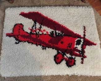 Hooked rug airplane theme