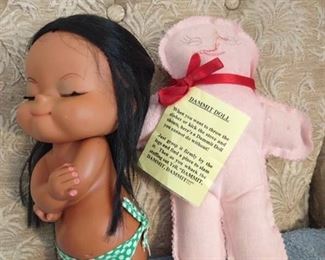 Hawaiian hula dancer doll with a damnit doll