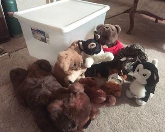 Sterilite 66 qt storage tote with various stuffed animals