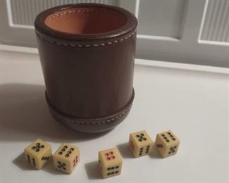 Vintage dice with leather cup