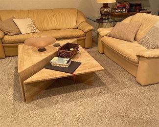 Leather love seat, leather sofa and marble coffee table