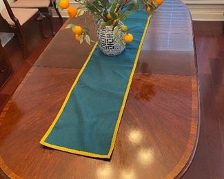 Queen Anne table with leaves and covers.