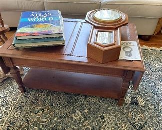 Vintage schoolhouse clock. Drop-leaf coffee table.