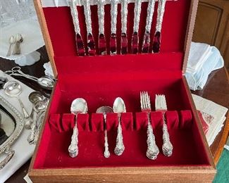 Sterling silver flatware for 8 plus one serving spoon. "French Scroll" by Alvin.