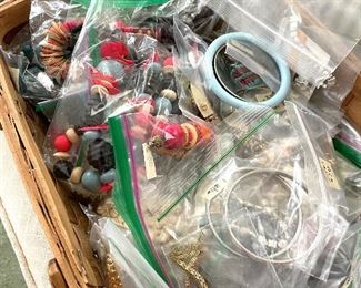 Basket full of bracelets and necklaces