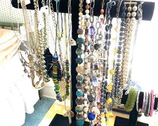 Many necklaces, some vintage