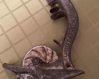 Antique cherry stoner 