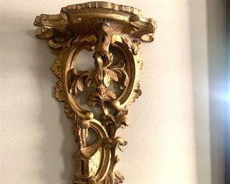 pair of matching wall sconce shelves