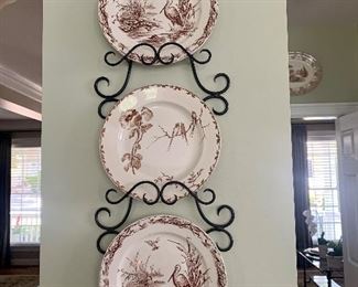 several pieces of brown transferware