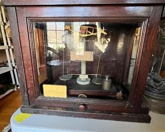 Vintage Weighing scale on a glass display