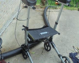 Standing upright walker w/arm rests & hand brakes