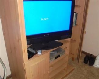 Wood entertainment center w/side opening for DVD's