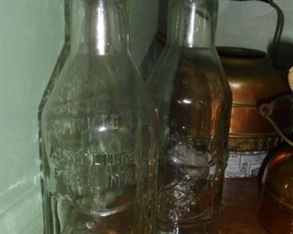 2 absolutely pure milk jars 