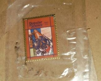 /metal stamp inclosed on back Popular Science 1918