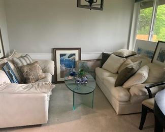 Two Beige Couches, Glass Coffee Table