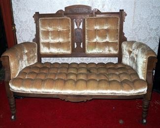 Antique Upholstered Parlor Sofa On Porcelain Casters, 40" x 56" x 21"