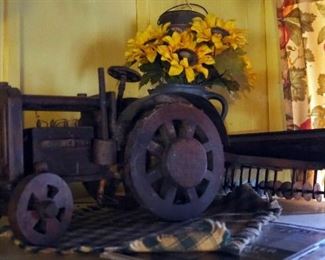 Hand Crafted Wood Model tractor With Disc Plow And Stoneware Jug With Sun Flowers
