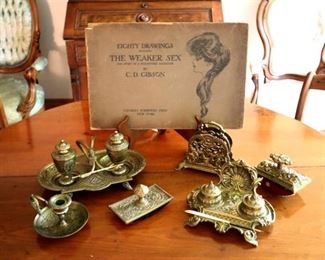 C.D. Gibson book ($25), Brass desk sets (Left $175, Right $150)
