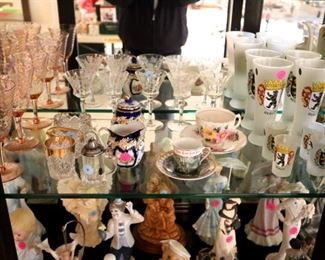 Porcelain figures ($10-25), tea items ($10-25), wine & beer glasses ($10-50)