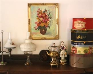 Walnut Sideboard ($250), oil lamps ($25-50), oil on canvas still life ($25), kettle ($25), porcelain figures ($25), hat boxes ($25)