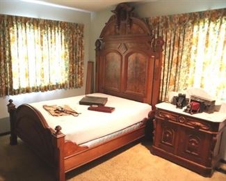 Victorian Walnut bed, 7' 11" high ($525)