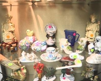 Porcelain & glass curio items ($1-10), carved Chinese ancestor figures ($25 each)