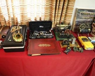 Coronet with case ($50), Natco Dynamic microphone ($50), & Selmer Clarinet ($100), Ansco projector ($10), model cars ($1-25), Steam train engines, including Weeden ($100 each)