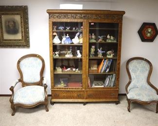 Victorian parlor chairs (armchair $100, ladies chair $50)  Victorian oak glass door bookcase ($525) , Midcentury wall clock ($10)