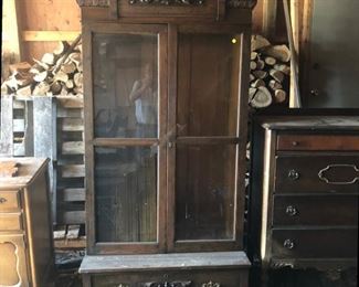 Dark oak two door bookcase $100