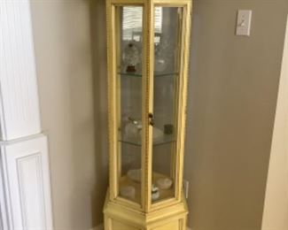 Yellow curio cabinet 