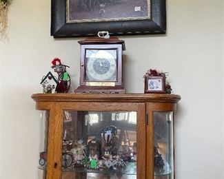 Display cabinet, figurines , mantle clock,  Dog picture...