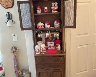 Nice small pine hutch, with Campbell's collectables,  lunch box and dolls on top. 
