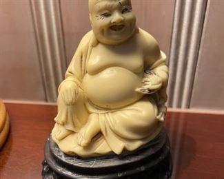 Miniature Carved Bone Buddha. Photo 1 of 2.