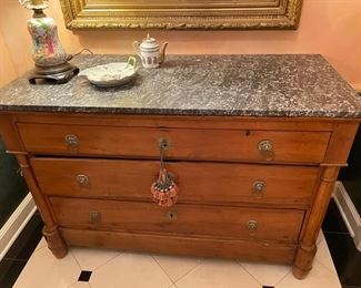 Antique English or French country marble top commode in honey finish with rare bullet feet & lion head pulls. Measures 51" W x 23"D x 35" H. Photo 2 of 3.
