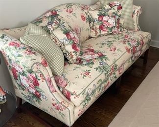 Floral Upholstered Down-Filled Camelback Loveseat. Measures 68" x 38."