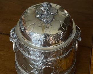 Antique English Biscuit Jar. Silver-Plate with Lilly Pad Engraving. Measures 9” H. Photo 2 of 5.