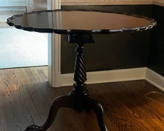 George II Mahogany Pie Crust, Tilt-Top Tea Table with Revolving Birdcage and Baluster Support and Three Cabriole Legs. Measures 34" D x 29" H. Photo 1 of 4.