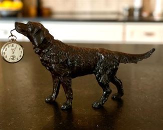 Bronzed Resin Retriever Holding a Clock. Photo 1 of 2.