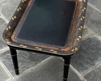 Ebony Metal Tray Table with Gilt Stenciling and Faux Bamboo Legs. Measures 28" W x 21" D x 16" H. Photo 1 of 3.