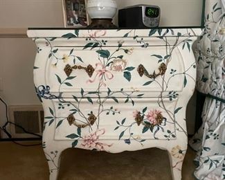 Trouvailles Inc. Floral Fabric Upholstered Side Table with Glass Top. Measures 23" W x 18" D x 24" H.