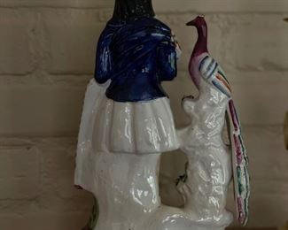 Scottish Staffordshire Porcelain Figurine with Peacock. Measures 14” H x 7” W. Photo 2 of 3.