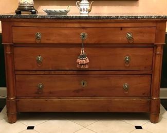 Antique English or French country marble top commode in honey finish with rare bullet feet & lion head pulls. Measures 51" W x 23"D x 35" H. Photo 1 of 4.