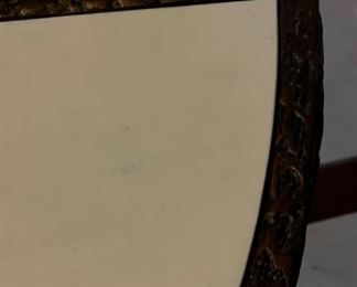 Mecox Gardens demilune with a hand-hammered gold bronze finish and ivory vellum top. Measures 32" W x 16" D x 32" H. Photo 3 of 3.