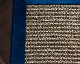 Custom sisal rug with teal mohair band. Measures 9' x 14'. Photo 1 of 2.