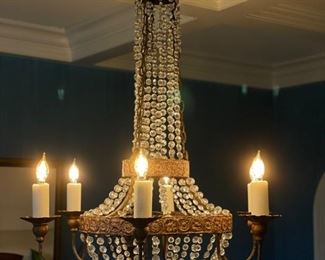 Crystal and brass chandelier. Photo 1 of 3.