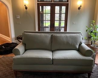 Pillow back sofa with new cushions upholstered in light sage color performance fabric with nailhead trim - 2 available. First measures 84" W x 37" D x 38" H; the second measures 75" W x 37" D x 38" H. Photo 1 of 3.